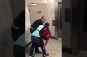 The Police State of Greece: Cop publicly abuses an immigrant selling umbrellas (Syntagma metro)