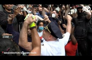 NYC's highest-ranking uniformed member takes a knee, hugs George Floyd protesters
