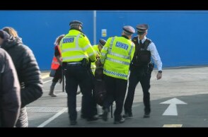 Arrests as Extinction Rebellion activists disrupt London airport | AFP