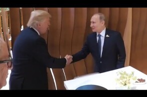 Donald Trump and Vladimir Putin shake hands for the first time