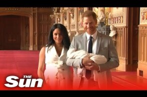 Prince Harry and Meghan Markle show off their new baby Archie to the world