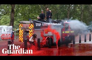 Fake blood sprayed on Treasury in Extinction Rebellion protest