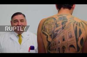Cancer survivor gets massive tattoo of doctor who cured him