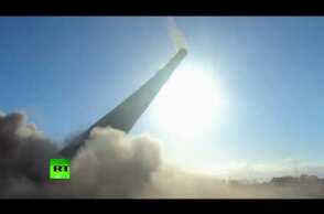 200-meter power station chimney destroyed in controlled demolition