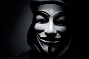 stock-photo-paris-france-january-man-wearing-vendetta-mask-this-mask-is-a-well-known-symbol-for-244924321.jpg