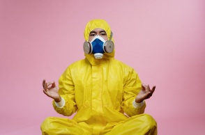 person-in-yellow-protective-suit-doing-a-yoga-pose-3951367.jpg