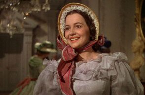 Η Ολίβια Ντε Χάβιλαντ ως «Μέλανι Χάμιλτον» στην κινηματογραφική ταινία «Όσα Παίρνει ο Άνεμος»