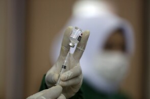 Ενβόλιο Covid-19 © EPA/HOTLI SIMANJUNTAK