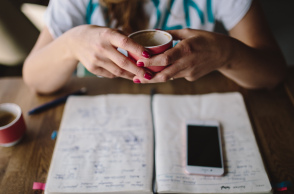 kaboompics_woman_holding_cup_of_coffee.jpg