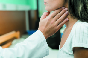 hand-touching-throat-patient