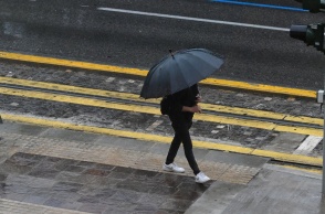 Άτομο με ομπρέλα