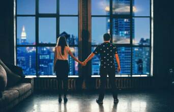 man and woman holding hands