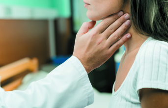 hand-touching-throat-patient