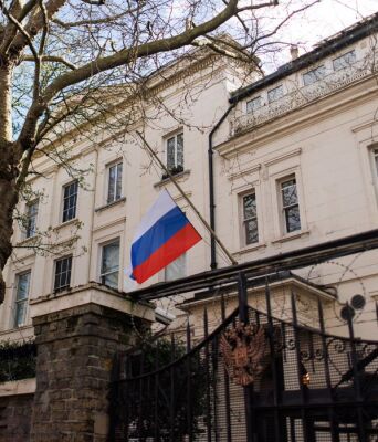 A half-mast flag is seen outside the Russian Embassy