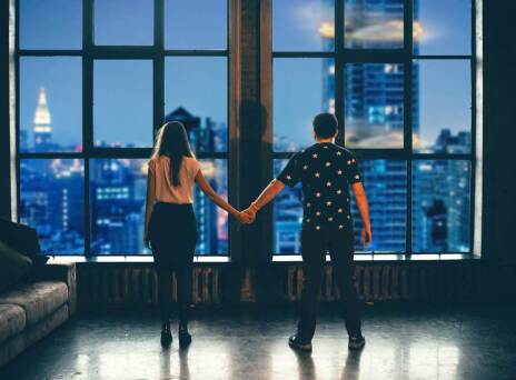 man and woman holding hands