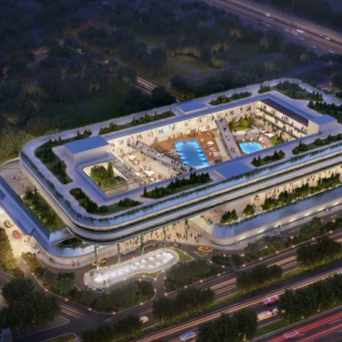 Κτηριακό συγκρότημα νύχτα, φωταγωγημένο