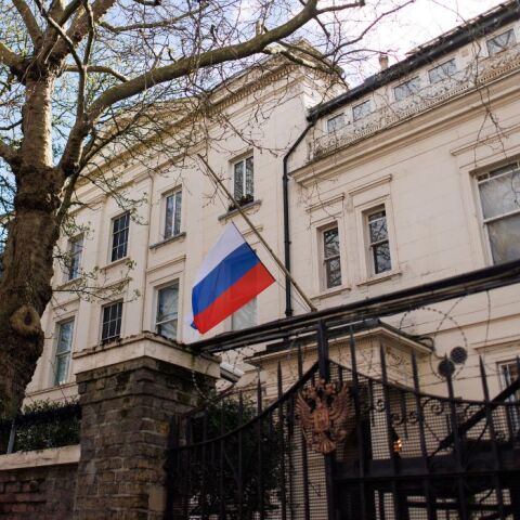 A half-mast flag is seen outside the Russian Embassy