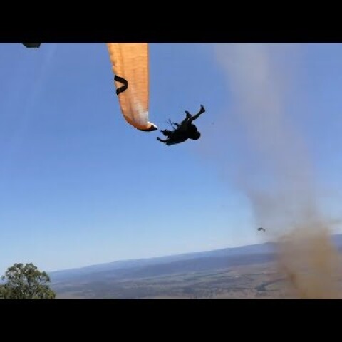 Dust devil sends paraglider flying