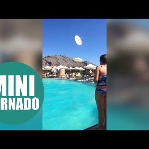Shocking footage shows mini-tornado in hotel swimming pool