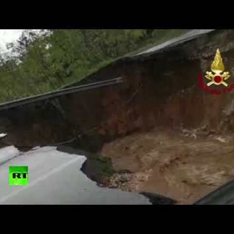 Huge sinkhole opens in Italian town after heavy rainfall, swallows car