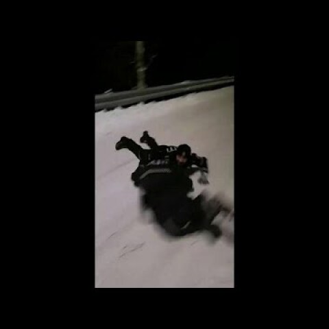 Snowed under? Norway police race each other using shields as sledges