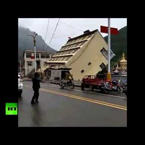 Caught on cam: Building collapses into river after heavy rains in Tibet