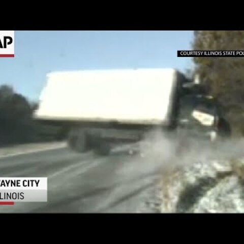 Dash camera shows close call on icy Illinois road