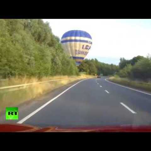 Nothing to see here, just a hot air balloon landing on UK road