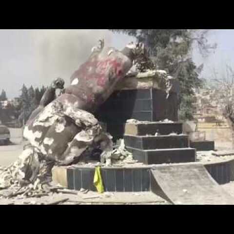 Turkey-backed forces pull down Kurdish statue in Afrin town centre