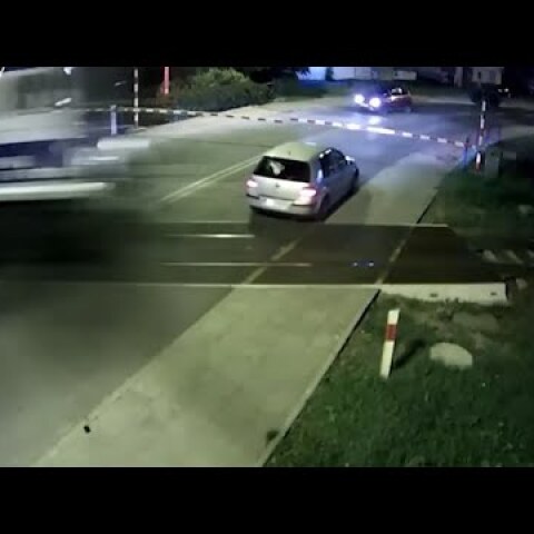 Raw: Vehicle Has Near Miss at Polish RR Crossing