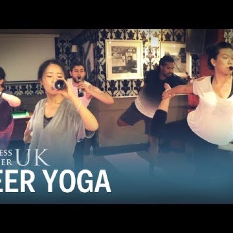 People are doing yoga while drinking beer