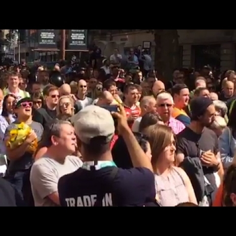 Manchester crowd joins in with woman singing Oasis after minute's silence - video