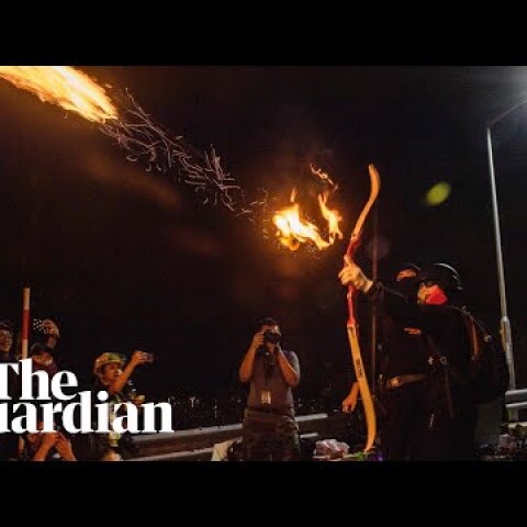 Hong Kong protesters shoot arrows at police during clashes at Chinese University