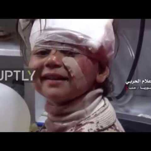 Syria: Child breaks into smile after surviving Saturday’s bus suicide bombing