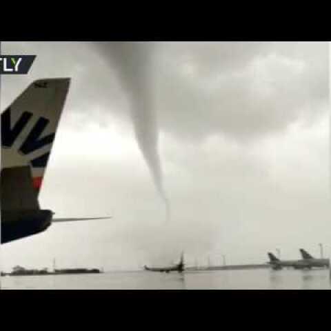 Damaged planes & toppled buses: Tornado wreaks havoc on Turkish airport