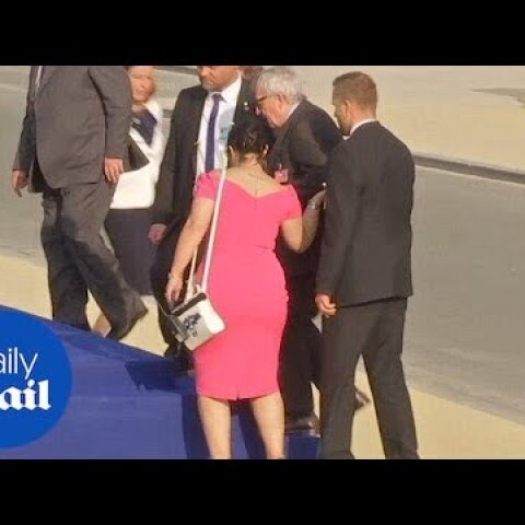 Jean-Claude Juncker stumbles and is helped by leaders at NATO gala