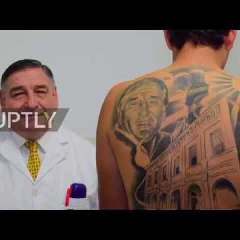Cancer survivor gets massive tattoo of doctor who cured him
