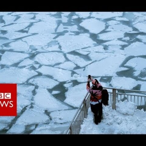 Chicago's frozen river from above - BBC News