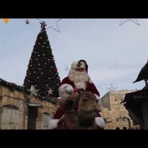 Palestinian Christian Issa Kassissieh Plays Santa in Jerusalem