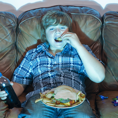 boy-watching-tv-eating-junk-food_1200px.jpg