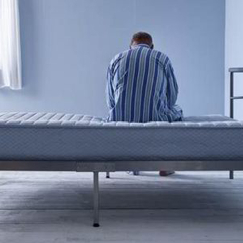 lonely-old-man-sat-on-bed-553719.jpg