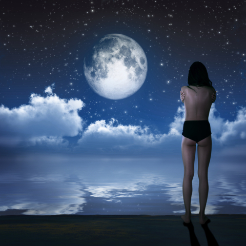 girl-standing-in-front-of-new-moon.jpg