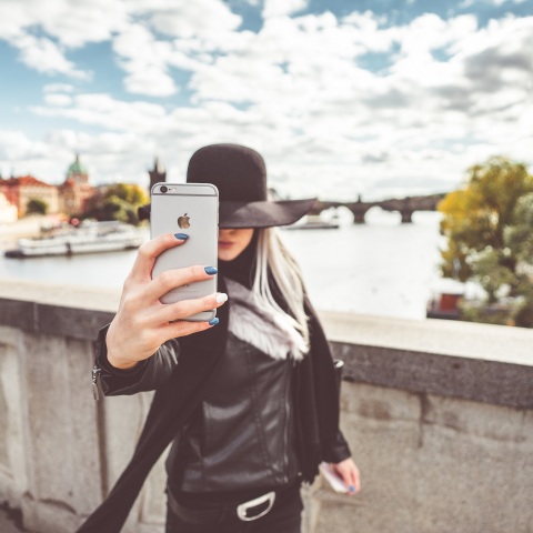 young-woman-taking-a-selfie-with-her-iphone-picjumbo-com.jpg