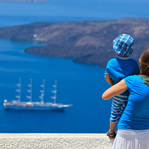woman-holding-her-son-looking-at-the-sea.jpg