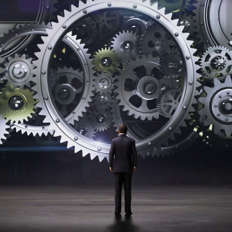 businessman-standing-big-gear-wheels-connecting-gear-wheels2_rcpcamkxx_thumbnail-full01.jpg