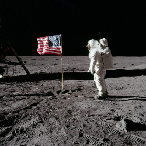 apollo-11-astronaut-and-us-flag-july-1969-768x711.jpg