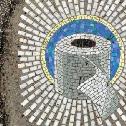 ψηφιδωτό που απεικονίζει ένα ρολό χαρτιού