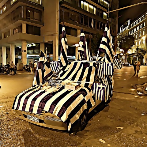 Εικονογράφηση αυτοκινήτου με ελληνικές σημαίες στο Σύνταγμα