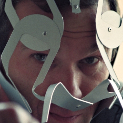 Ο Κορνήλιος Γραμμένος φορώντας μία από τις "Μάσκες" του (1997)