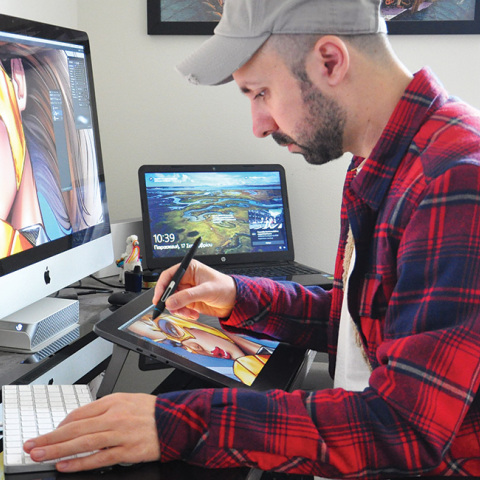 O illustrator και cover artist Elias Chatzoudis σχεδιάζει ένα από τα Pin-up κορίτσια του